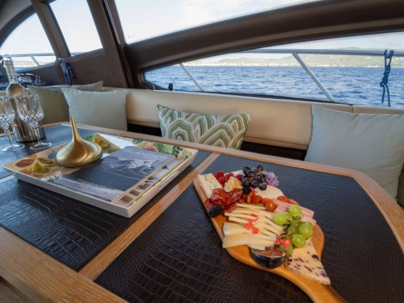 Charter yacht Azimut 64 Not Dead Yet interior dinning area.