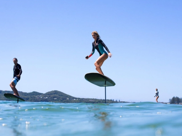 Group of people with eFoils on the sea.