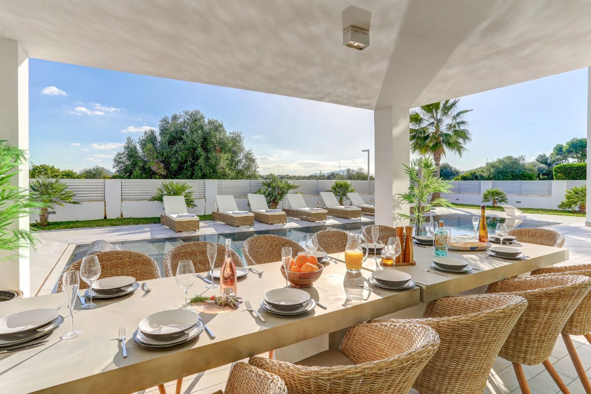 Exterior dining area of property Pollensa Sea View in Mallorca.