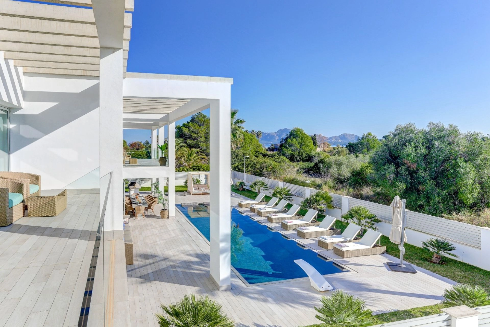 Exterior and pool of property Pollensa Sea View in Mallorca.
