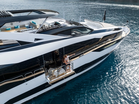 Balconey of charter yacht Sunseeker 95 Blue Infinity One with couple.
