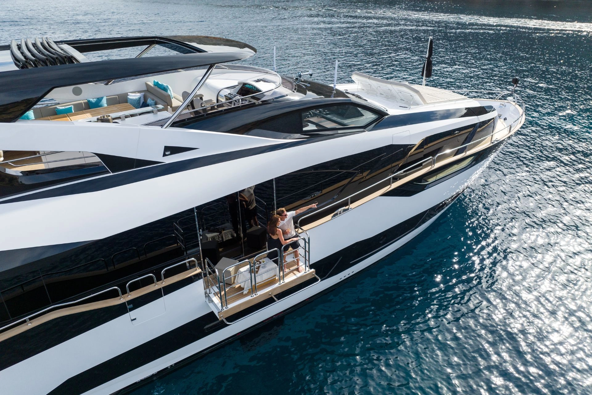 Balconey of charter yacht Sunseeker 95 Blue Infinity One with couple.