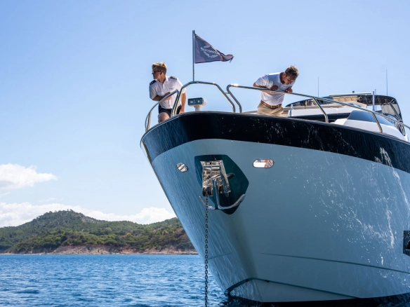 Crew on bow of Sunseeker 95 High Energy.