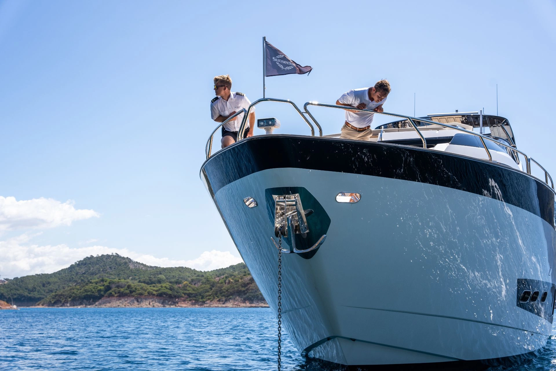 Crew on bow of Sunseeker 95 High Energy.