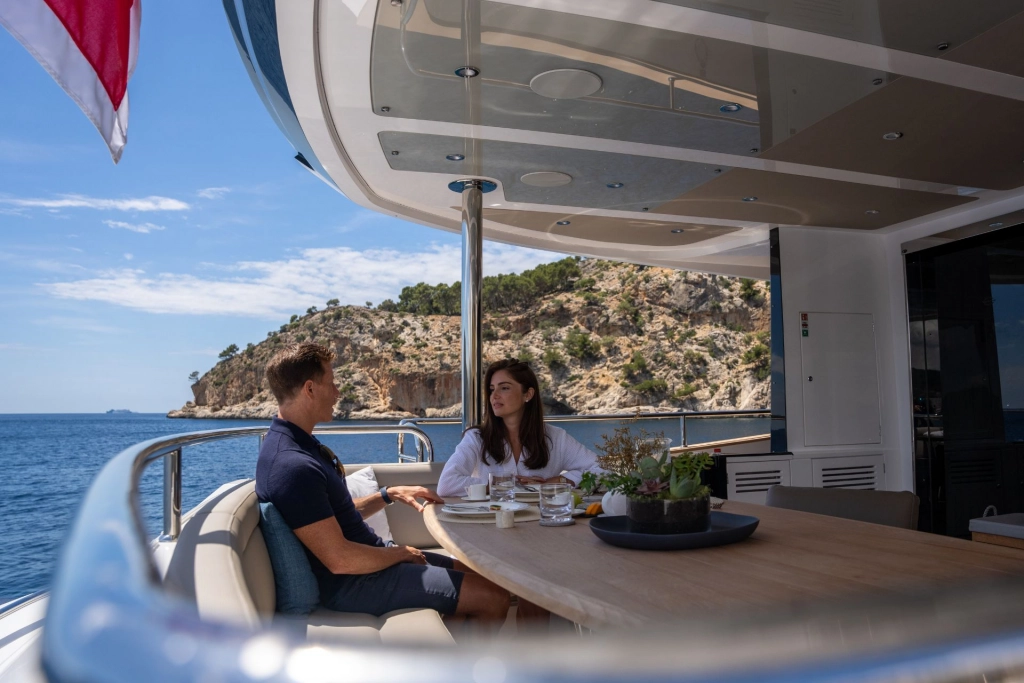 Couple on charter yacht Sunseeker 95 High Energy.