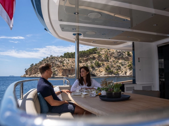 Couple on charter yacht Sunseeker 95 High Energy.