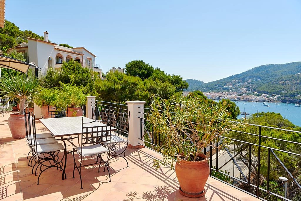 Exterior dining area and view of Top of the Ocean property in Port d'Andratx in Mallorca.