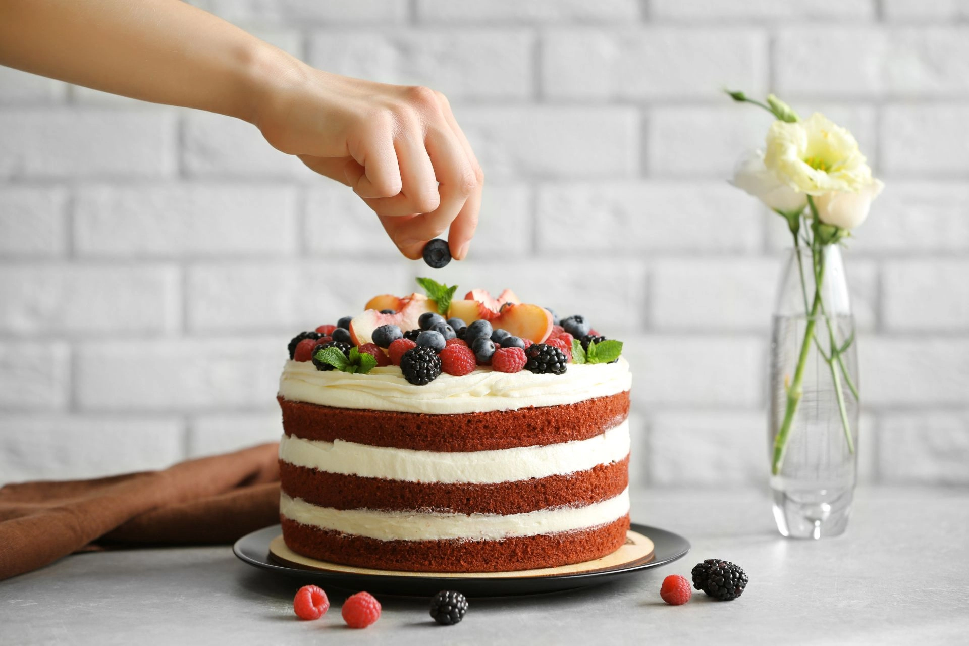 Birthday cake with fresh fruits.