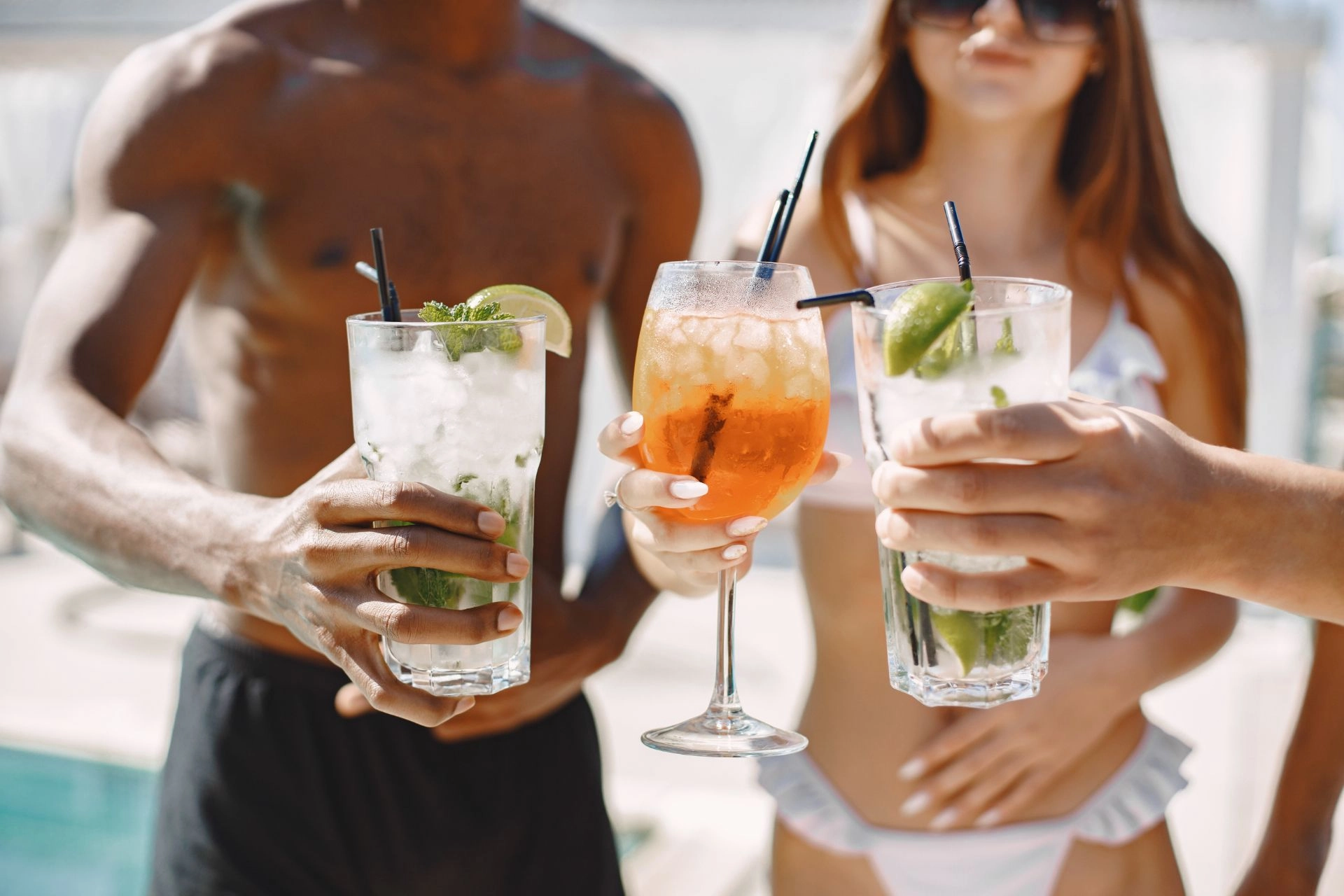 Group of friends with cocktails.