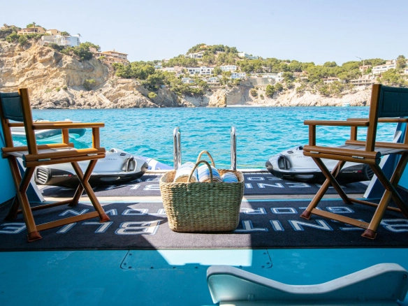 Beach club of Evolution Yachts Benita Blue.