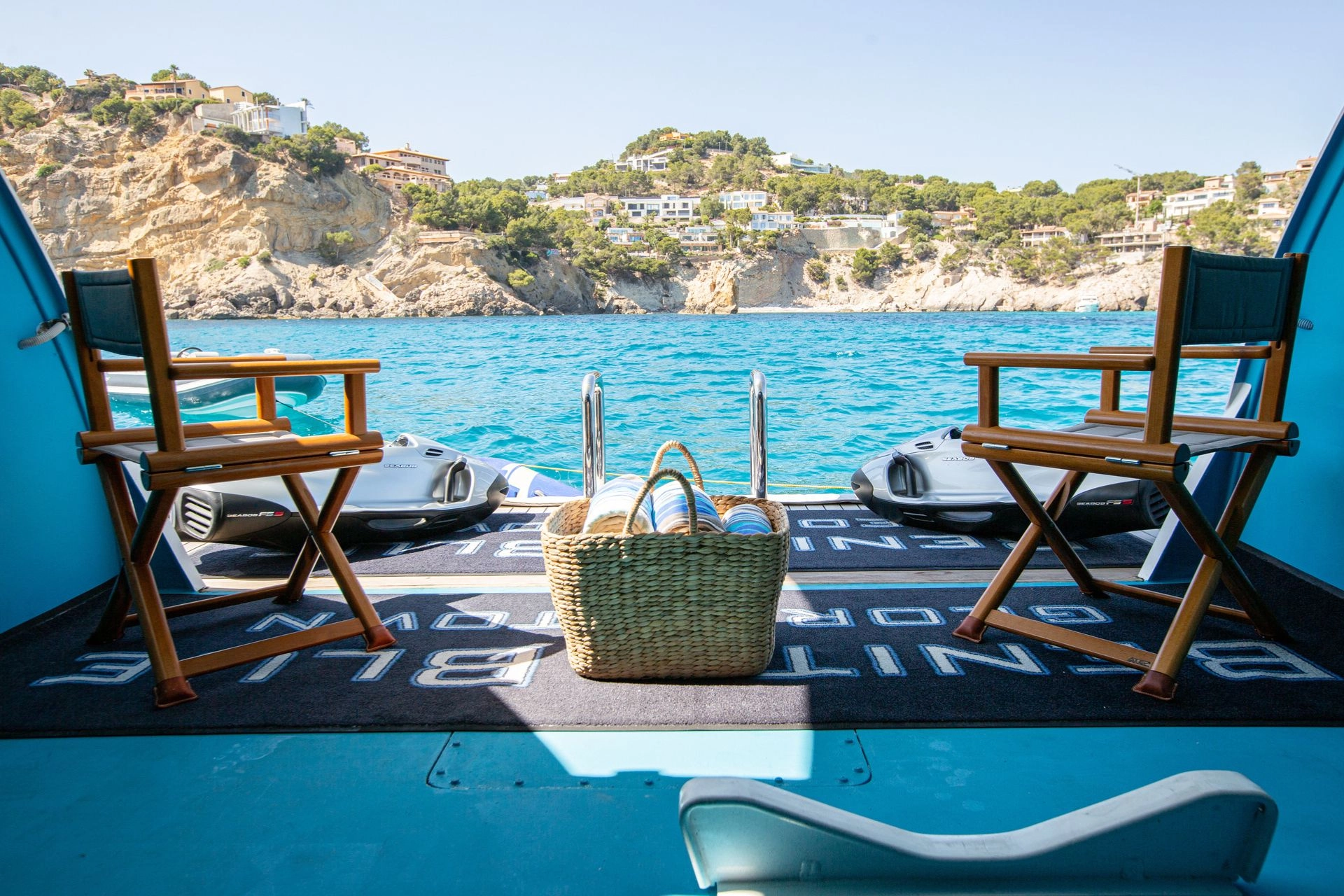 Beach club of Evolution Yachts Benita Blue.