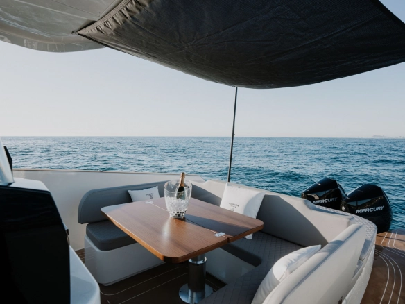 Dining area of charter yacht Kumbra 34 in Mallorca.