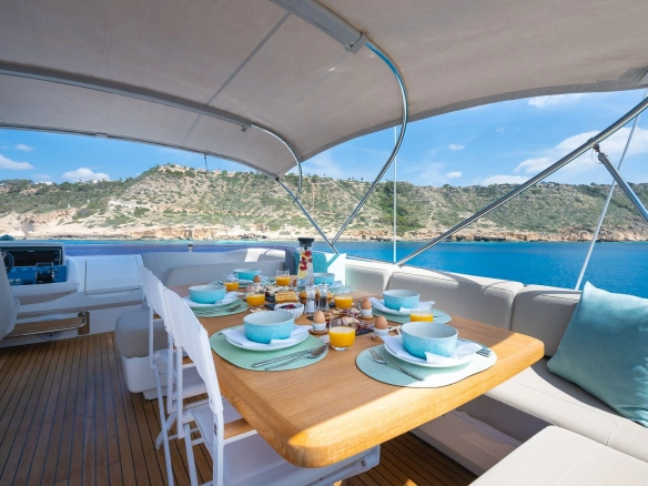 Deck table of charter yacht Princess 68 Zen in Mallorca.