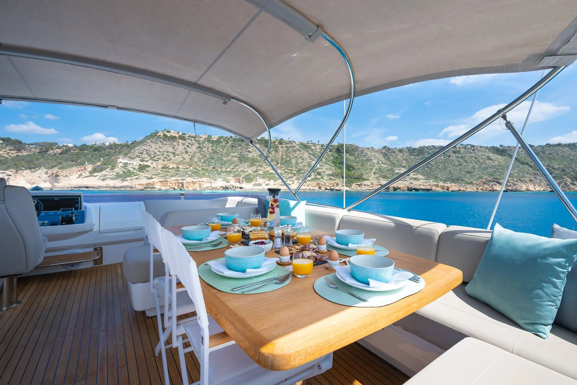 Deck table of charter yacht Princess 68 Zen in Mallorca.