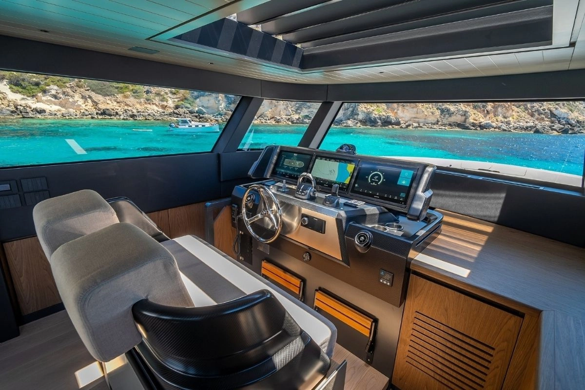 Helm of charter yacht Bluegame 74 in Mallorca.