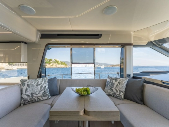 Interior dining area of charter yacht Absolute 47 Fly Tres Amigos.