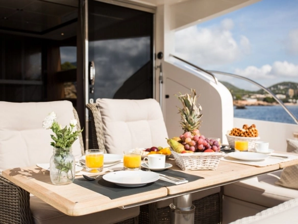 Dining area of yacht Princess 64 K4.