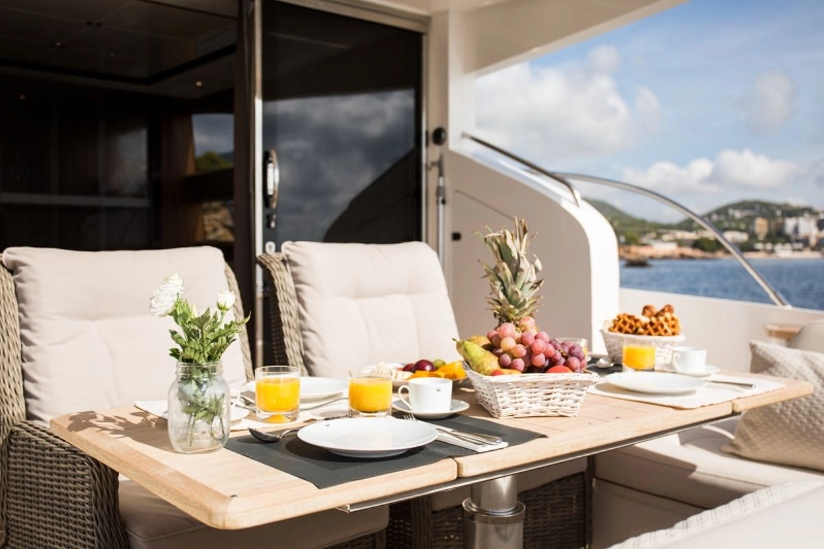 Dining area of yacht Princess 64 K4.